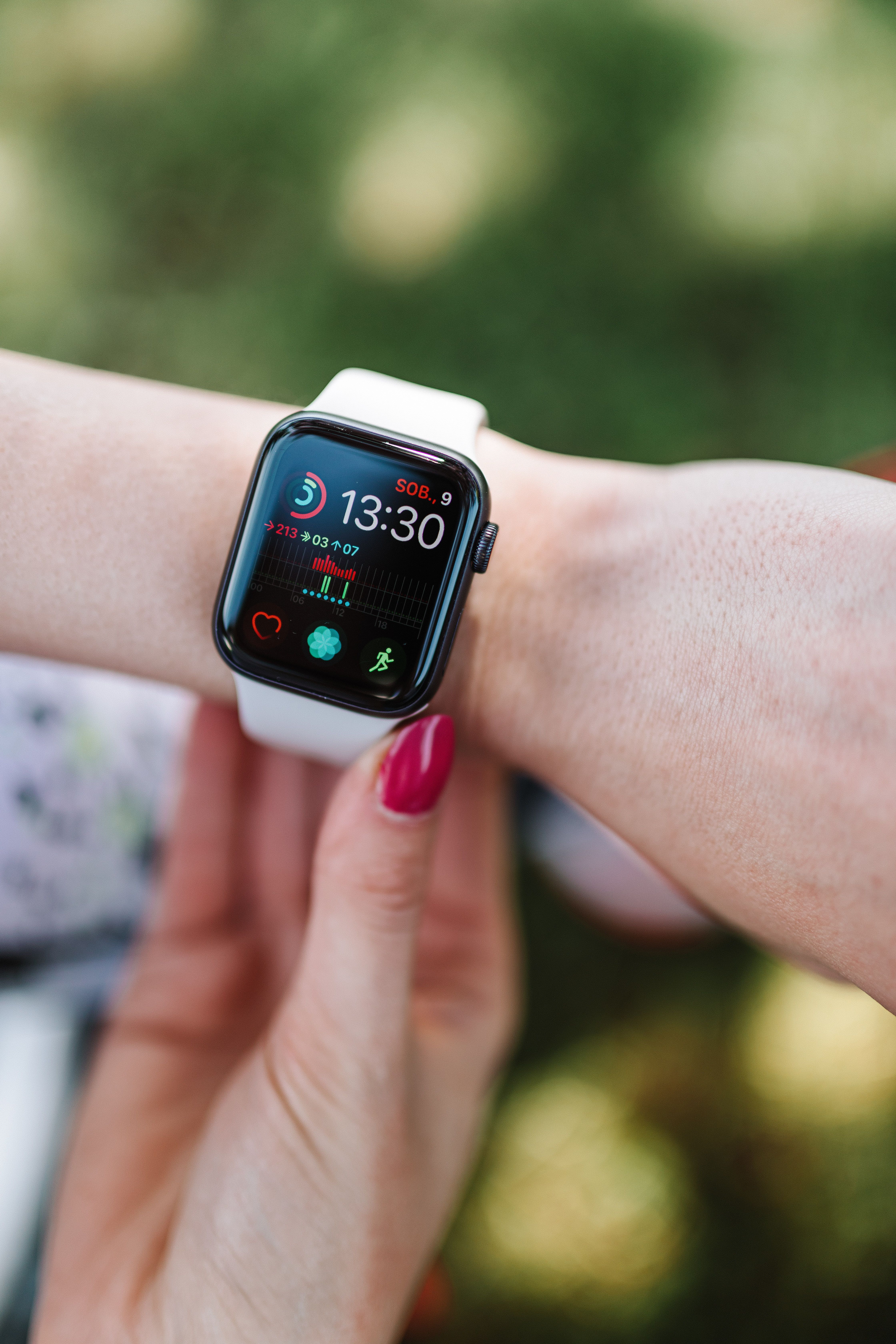 Close-up of a person wearing an Apple Watch on their wrist