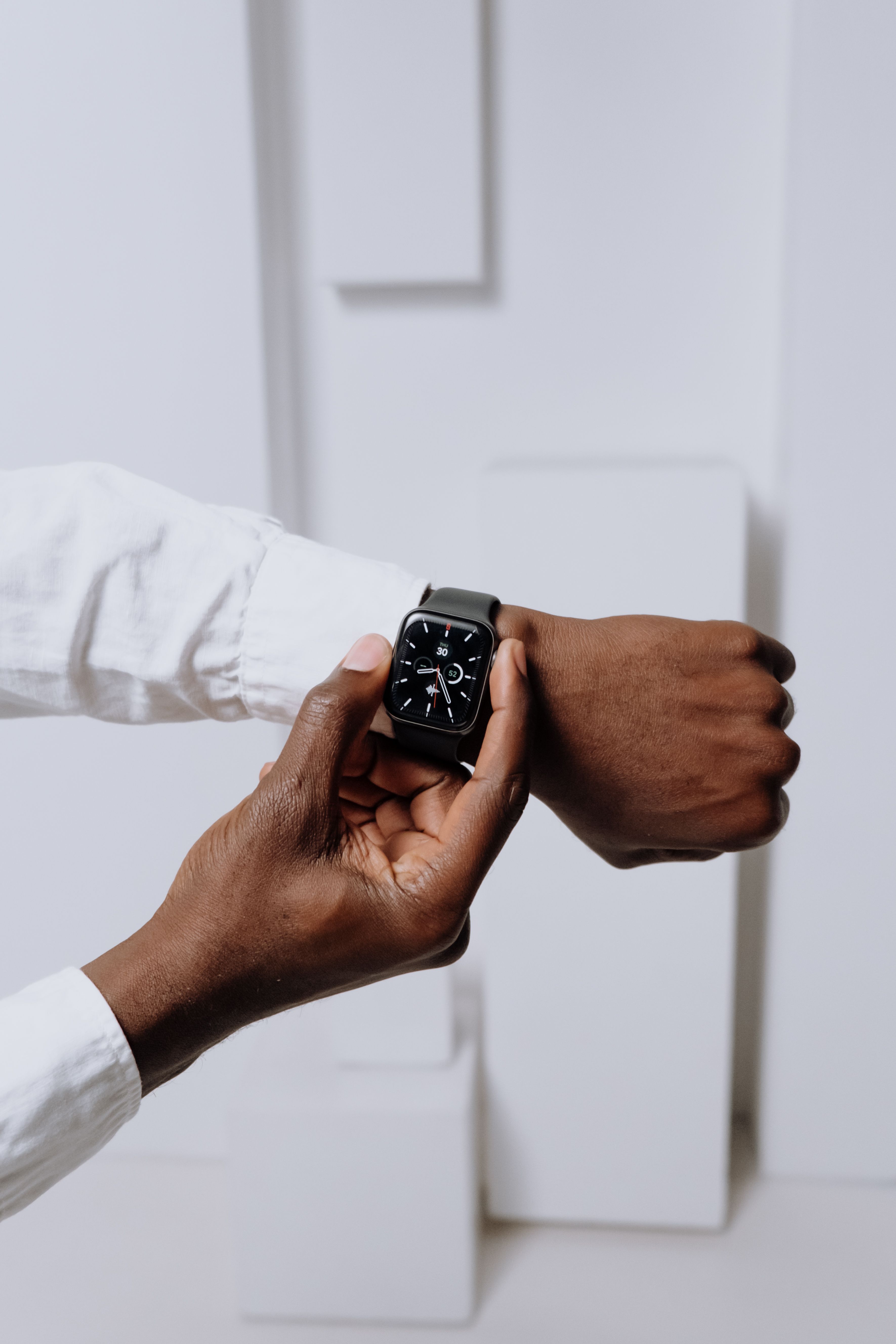 Close-up of a modern smartwatch on a person's wrist