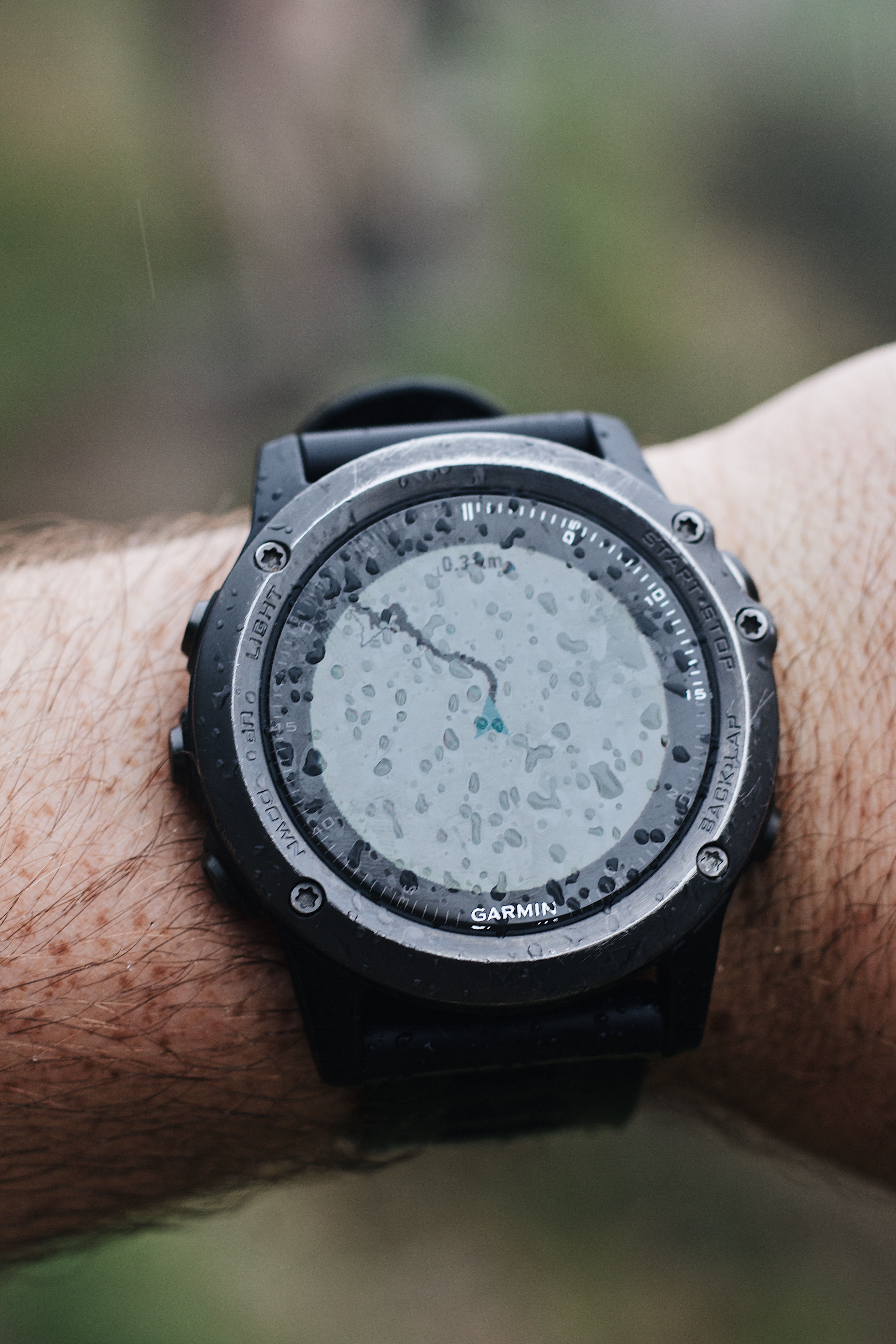 Close-up shot of a rugged Garmin outdoor watch